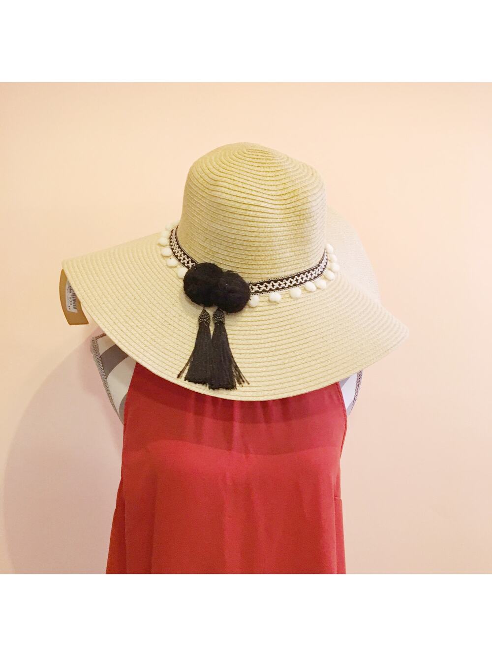 Woven wide brim oversized sun hat with poms and tassels synthetic straw